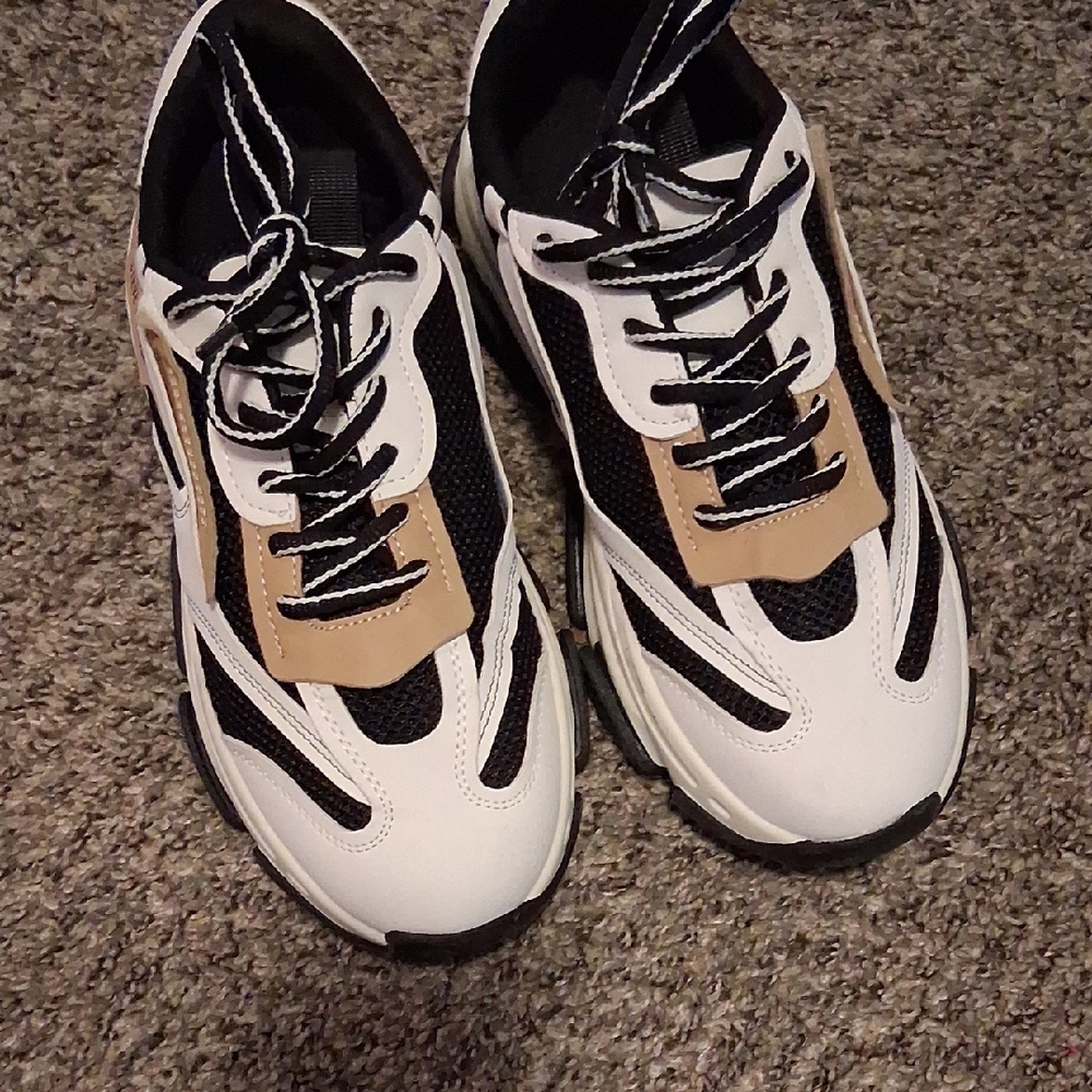 Steve Madden Stylish Black and White Sneakers with Tan Accents